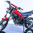 Load image into Gallery viewer, Red Magician dirt bike with off-road tires, black seat, and front headlight on display.