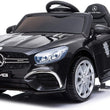 Load image into Gallery viewer, Black Mercedes-Benz AMG kids ride-on toy car with realistic design features, including signature logo, detailed headlights, and chrome accents.