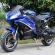 Load image into Gallery viewer, Blue sport motorcycle parked on a driveway with trees in the background.