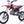 Load image into Gallery viewer, Red and white dirt bike with a sporty design, featuring knobby tires, front suspension, and a sleek seat suitable for off-road adventures.
